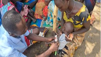Staff during Passive case finding (MUAC screening) at Naguzen mobile site (Photo courtesy of Obwoya-Nutrition Manager)2